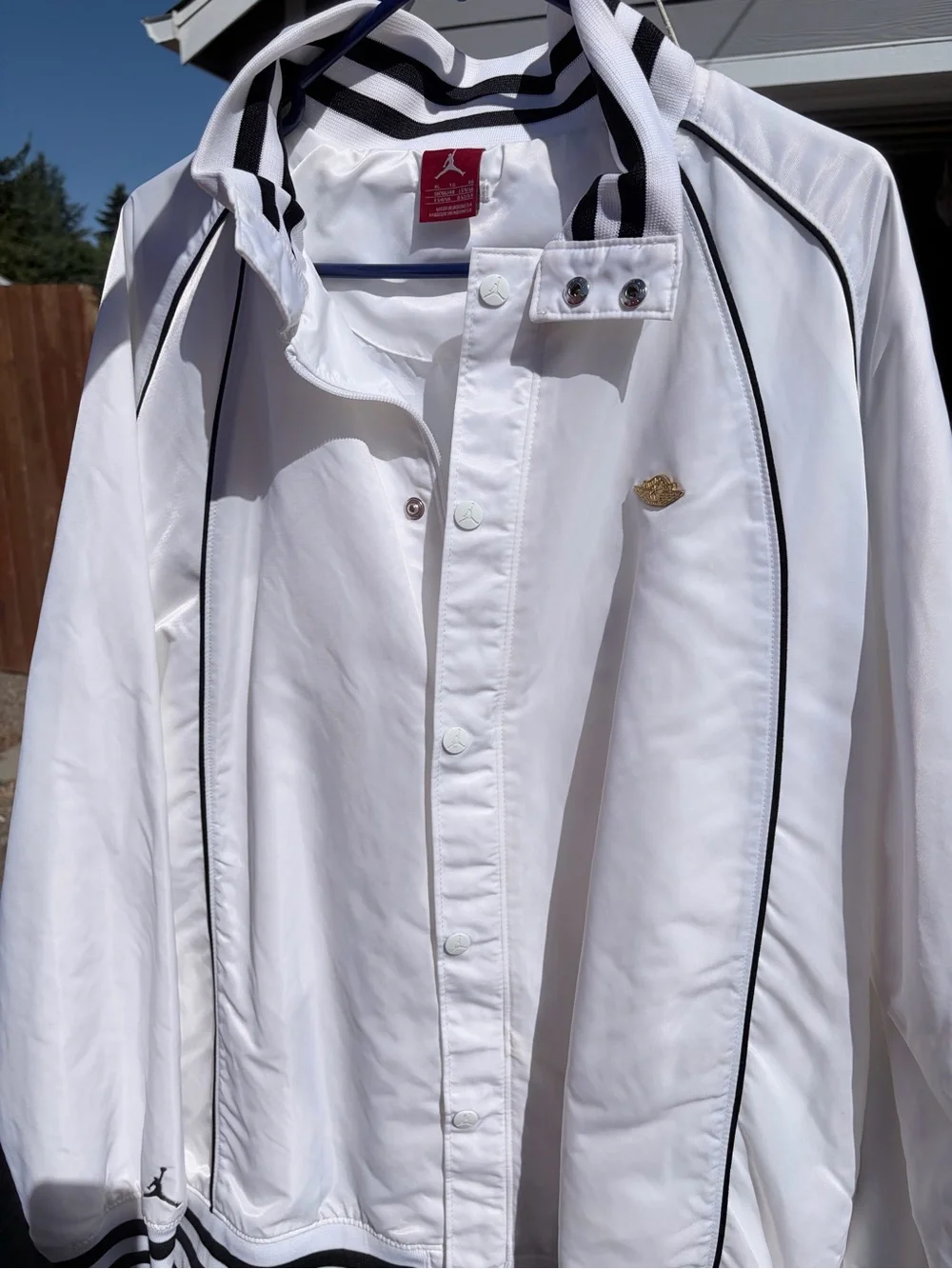 Jordan White Jacket with Black Collar Stripe and Red Jumpman Tag